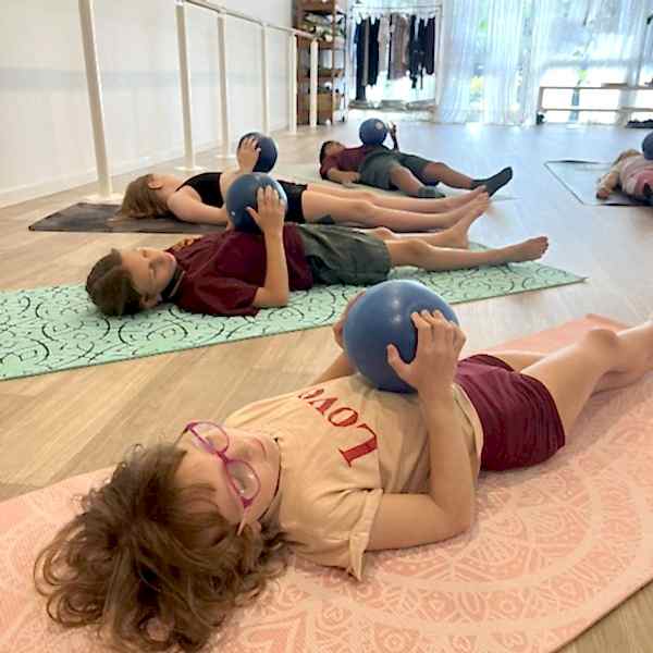 Kids yoga classes sunshine coast haven yoga studio buderim happy smiling mindfulness meditation